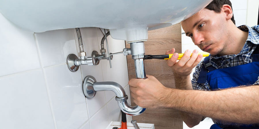 plumber tightening screws