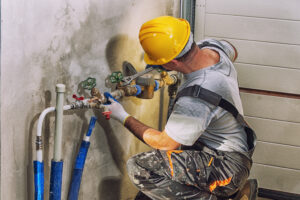 Plumbing,services,,plumber,at,work