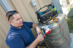 Air,conditioner,repair,man.,using,testing,equipment,on,outside,unit.