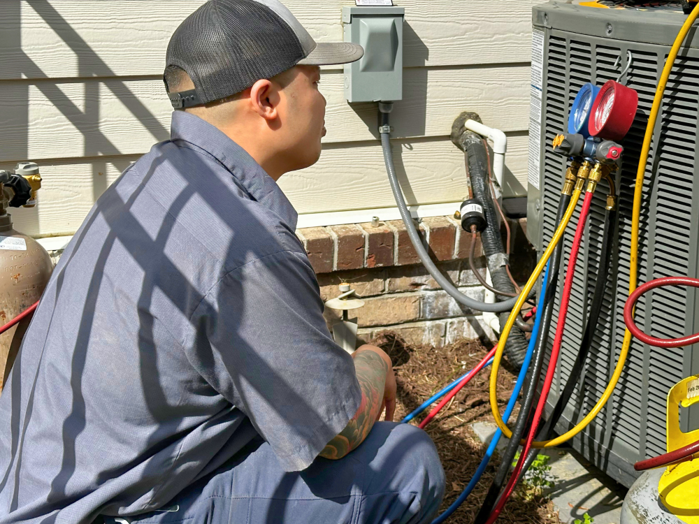 technicians working on AC