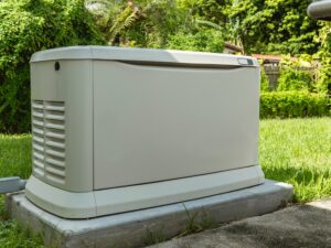 A,home,standby,generator,installed,at,the,backyard,of,a